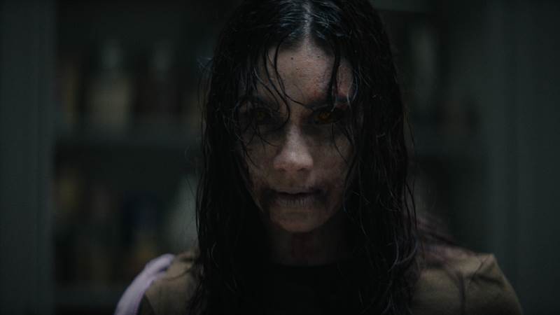 Evil Dead Burn Courtesy of New Line Cinema. All Rights Reserved.
