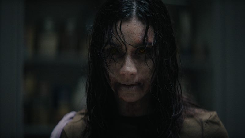 Evil Dead Burn Courtesy of New Line Cinema. All Rights Reserved.