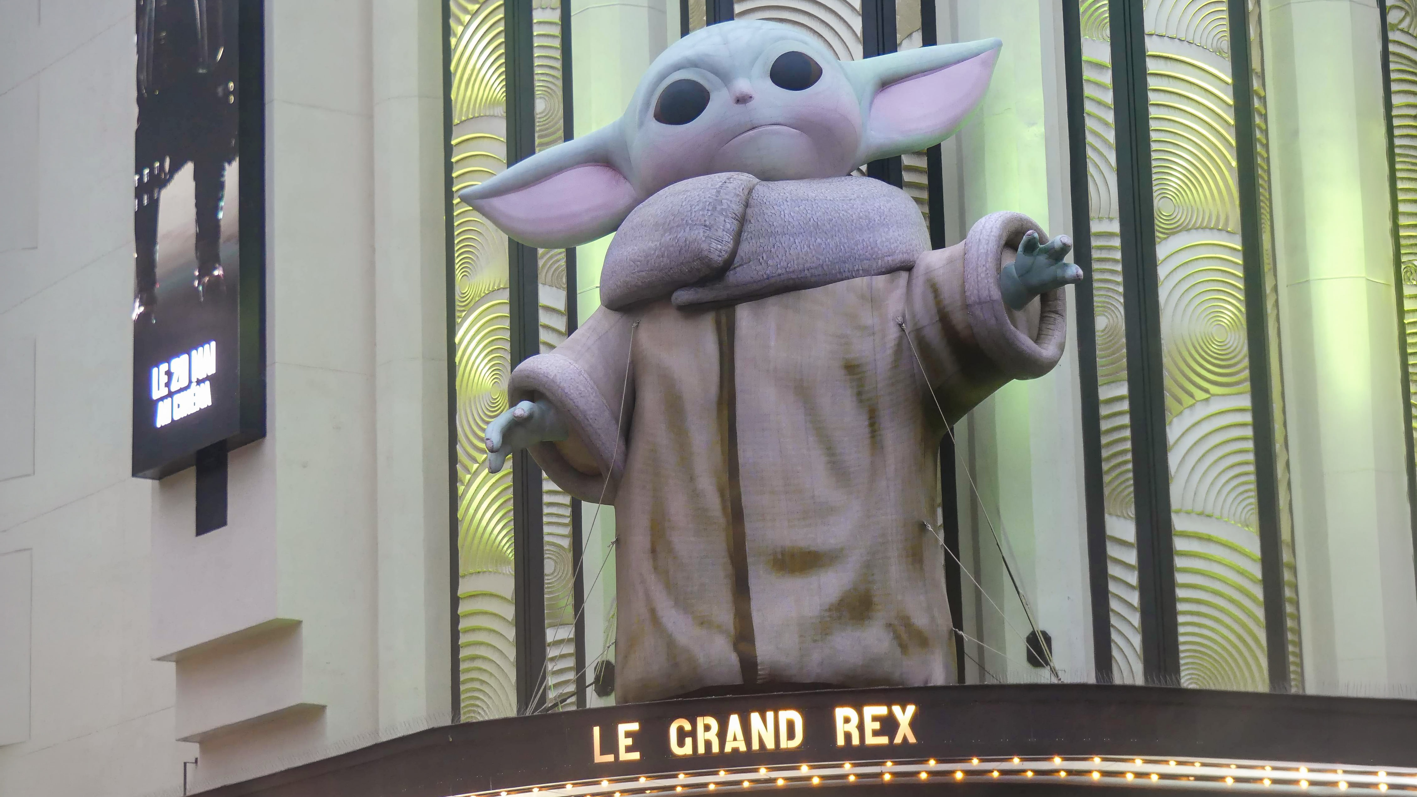 Giant Grogu display outside Le Grand Rex in Paris for The Mandalorian and Grogu event